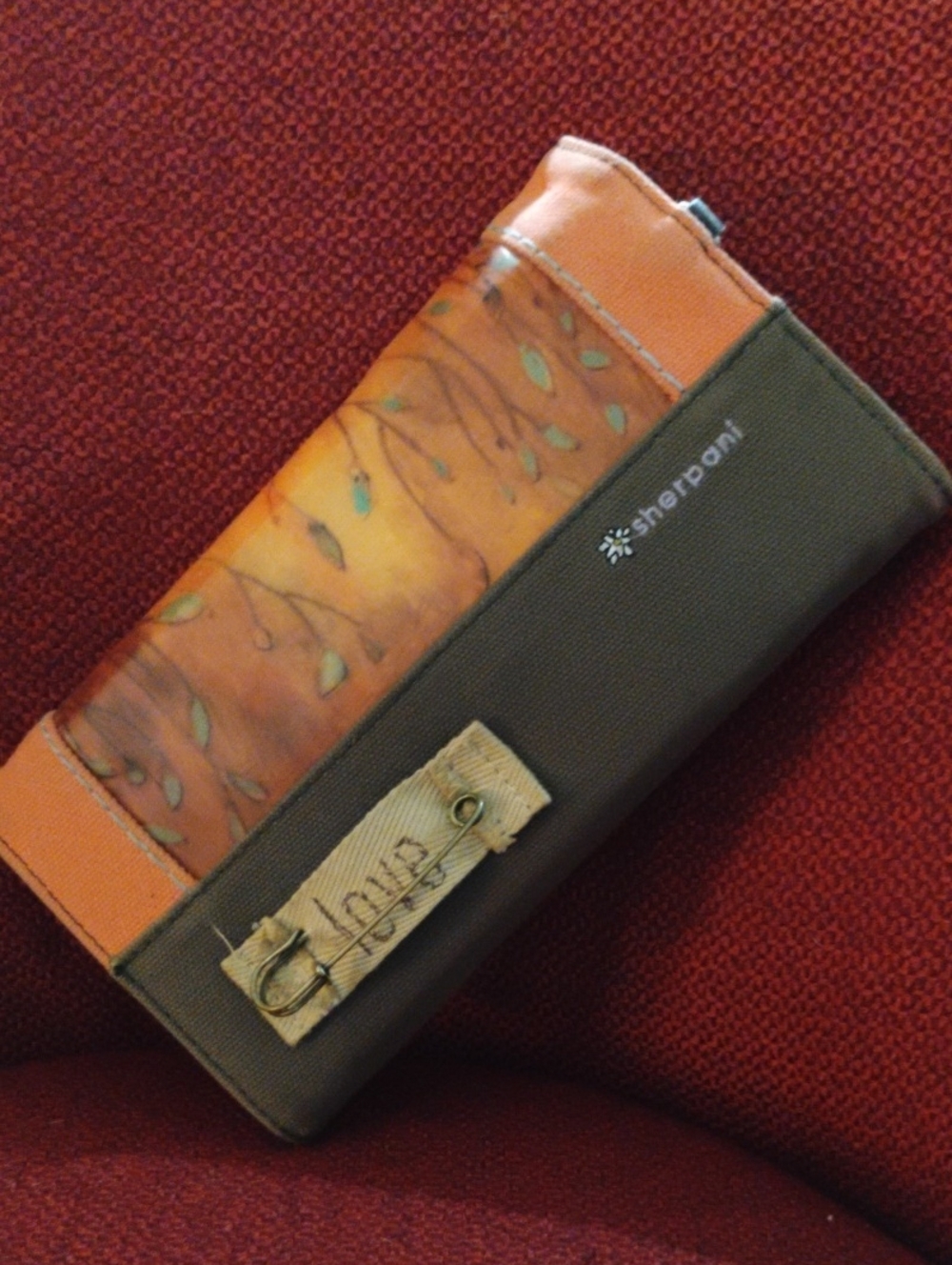 Sherpani Wallet - Bright Orange Canvas with Red Bird and White Daisies